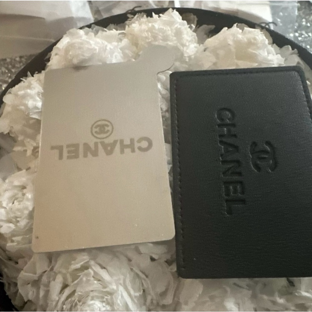 Chanel beauty mirror in elegant black protective cover